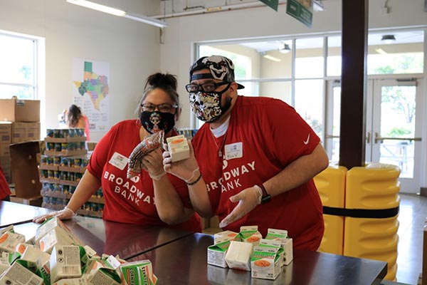 Broadway Bank employees volunteer at a food distribution center