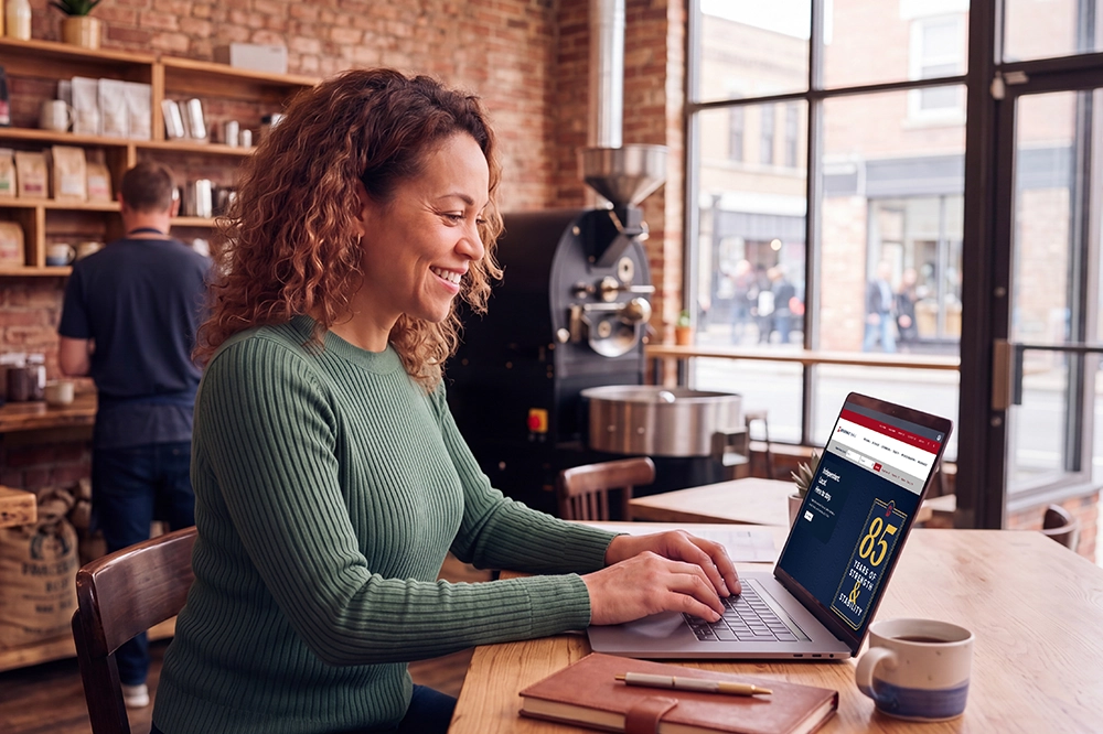 a business woman browsing the broadway bank website