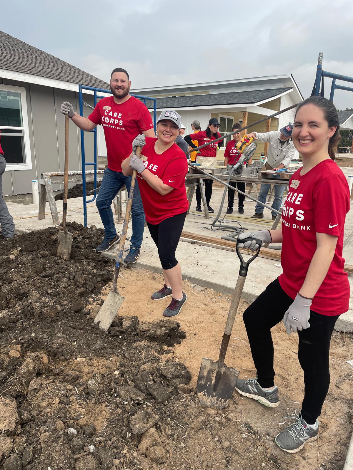 Broadway Bank Care Corps Volunteers helping build a house