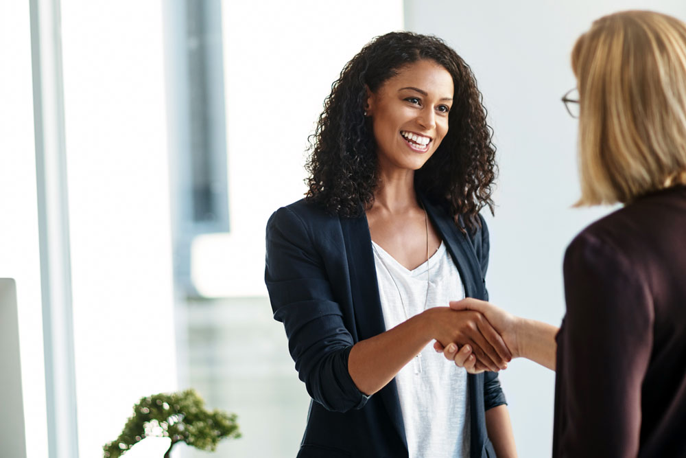 A banker shaking hands with a client