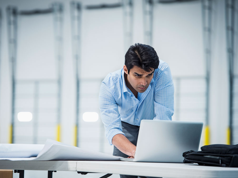 Businessman looking at a computer