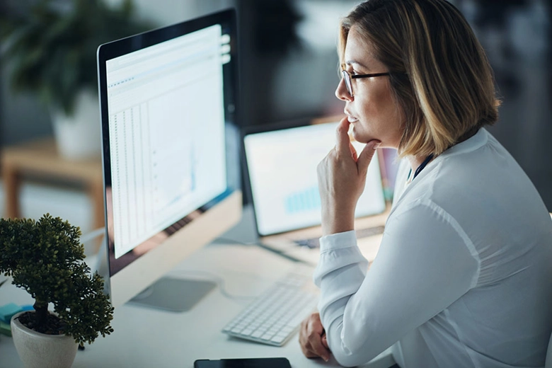Woman looking at computer screen
