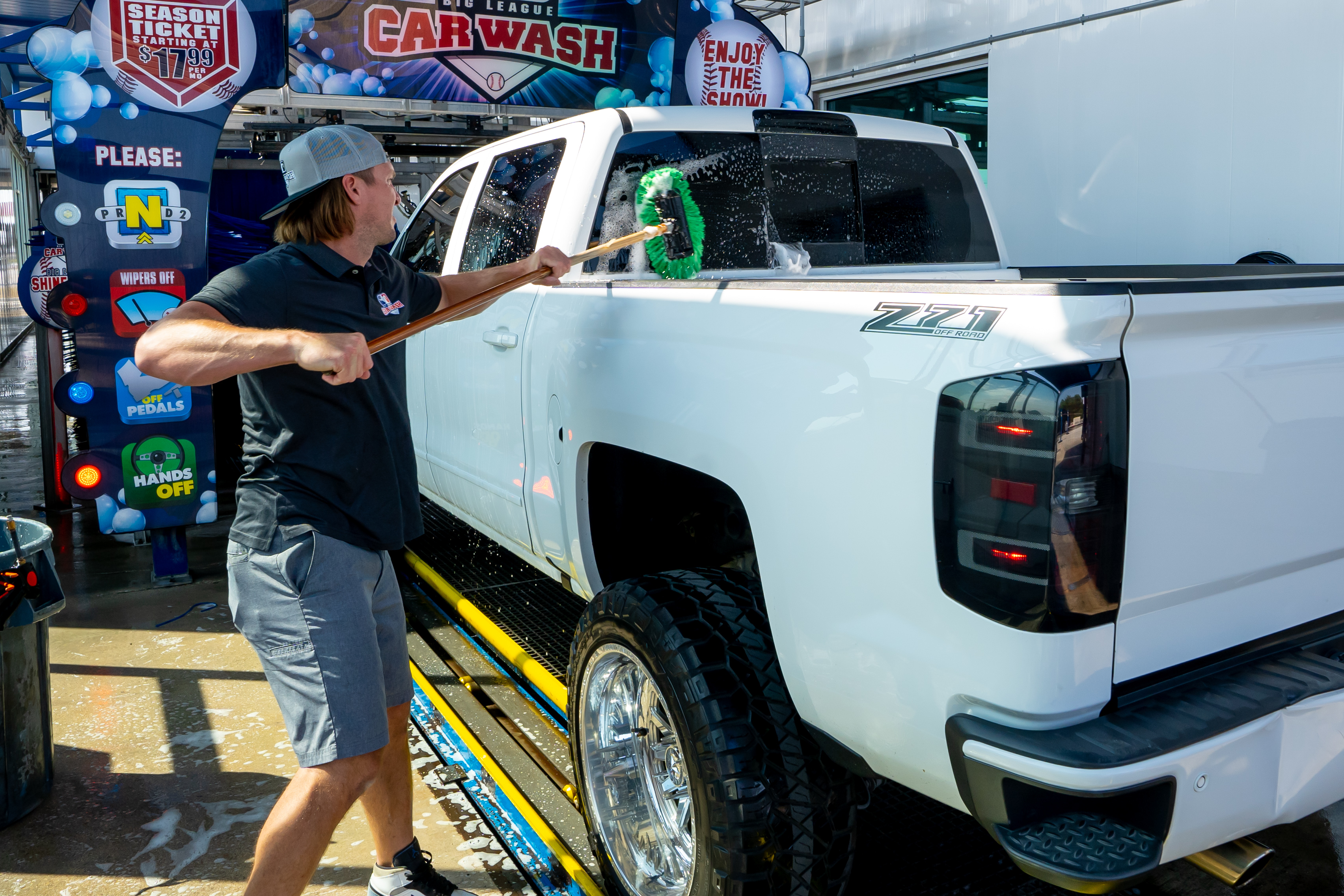 Daniel washing cars