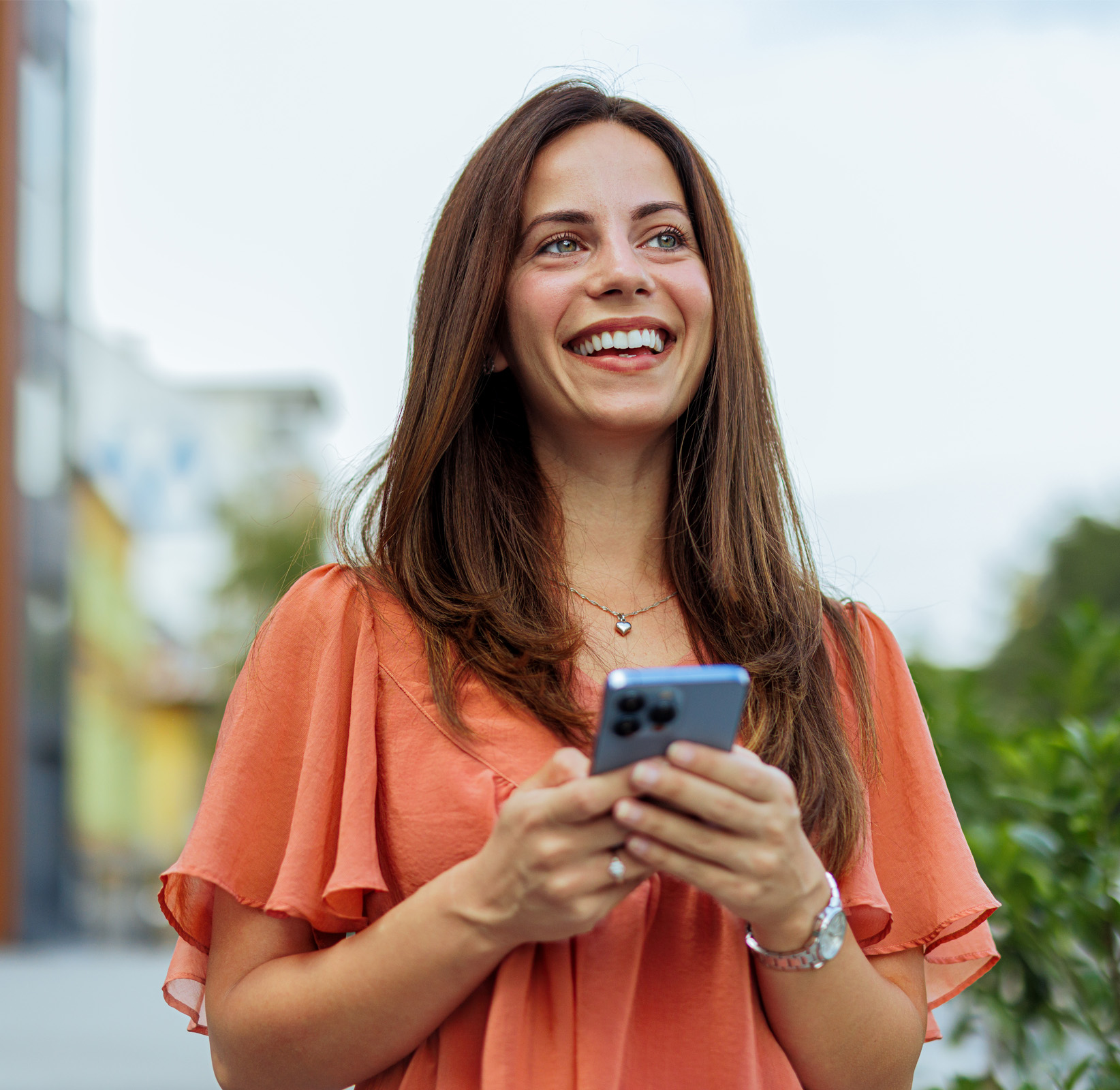 Young lady holding a phone