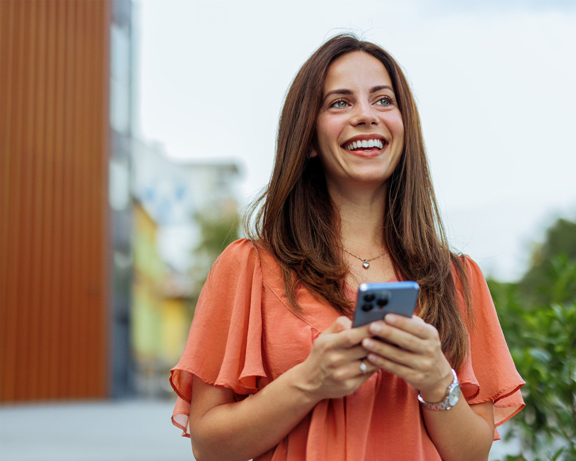 Young lady holding a phone