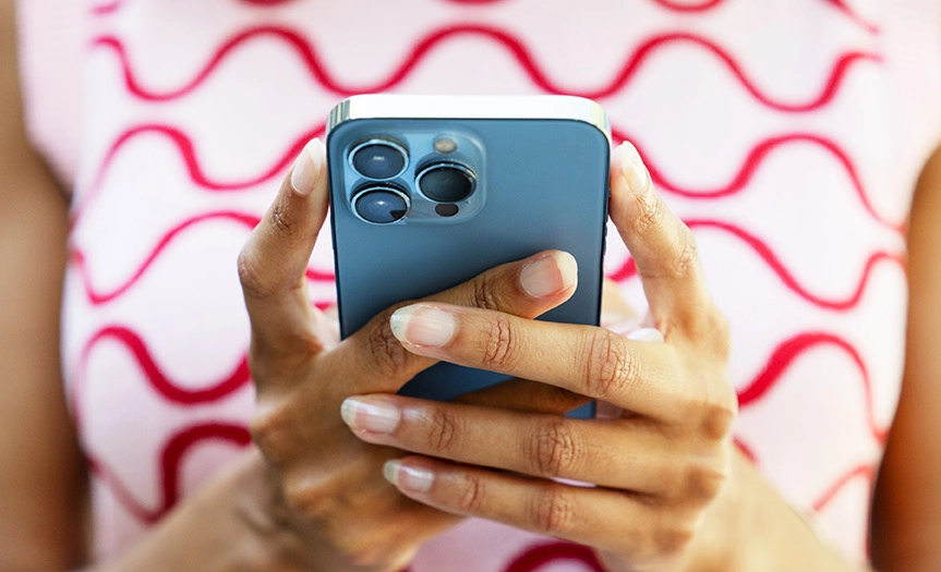 Woman holding a phone in her hands