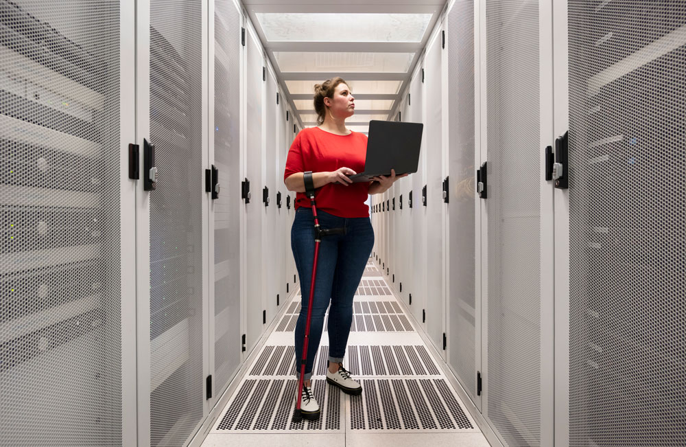 woman works in server room